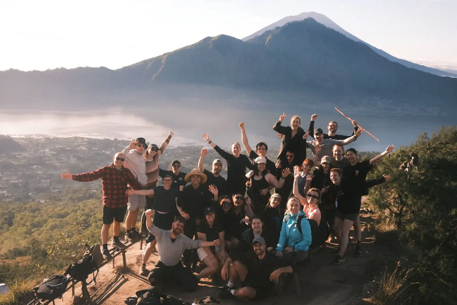 The group cheering at the top of Mt Batur