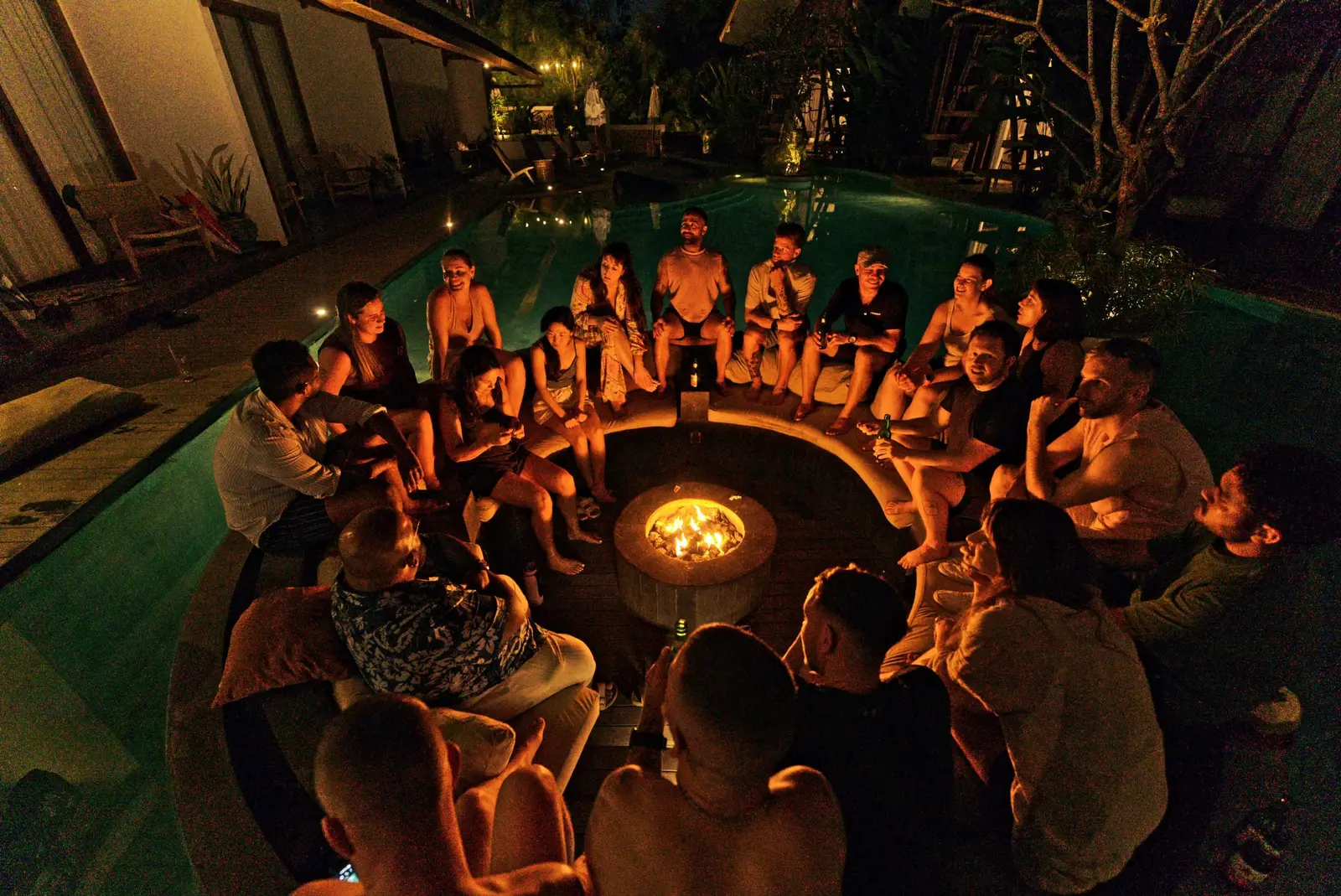 The group around the fire pit at night, Driven Young Founders Retreat